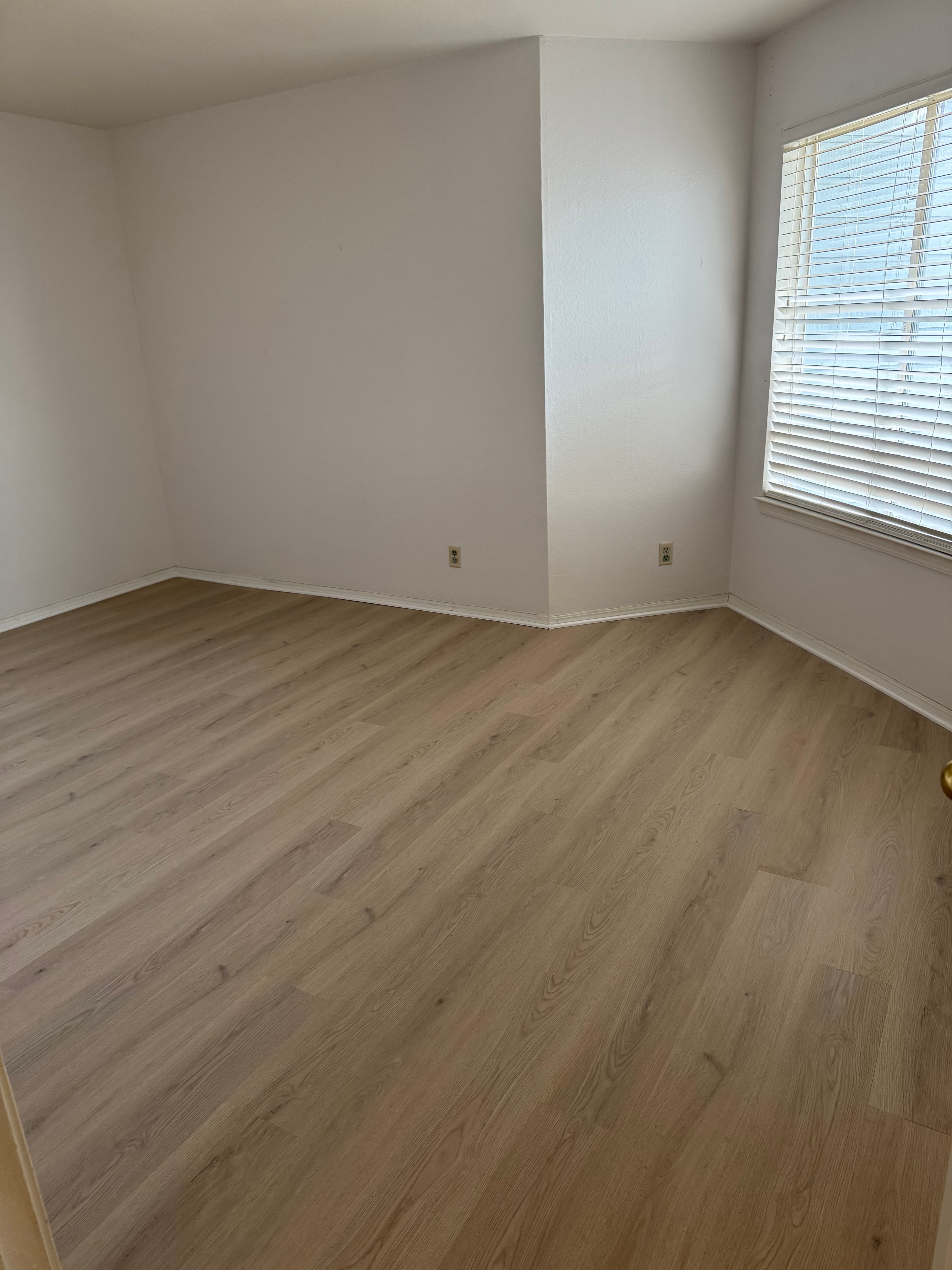 LVP vinyl plank flooring installed in a bedroom