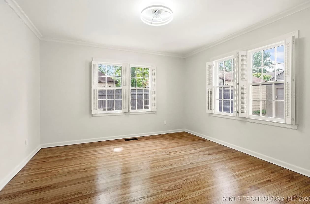Clean interior paint job with crisp trim and window lines